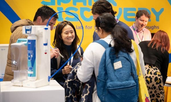 Lab innovations stand group yellow bg.jpg NOL